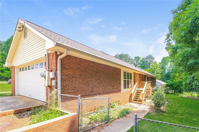 263 Austin Rd, Stockbridge, GA 30281 - view of home's exterior featuring brick siding, a gate, a lawn, and fence