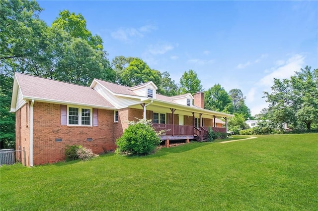 263 Austin Rd, Stockbridge, GA 30281 - back of property with covered porch, a yard, brick siding, and crawl space