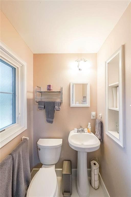 2889 Mount Olive Dr, Decatur, GA 30033 - half bathroom featuring toilet and baseboards