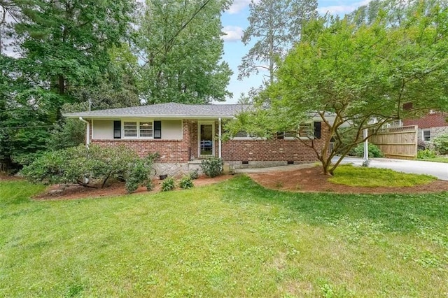 2889 Mount Olive Dr, Decatur, GA 30033 - view of front of property with crawl space, brick siding, and driveway