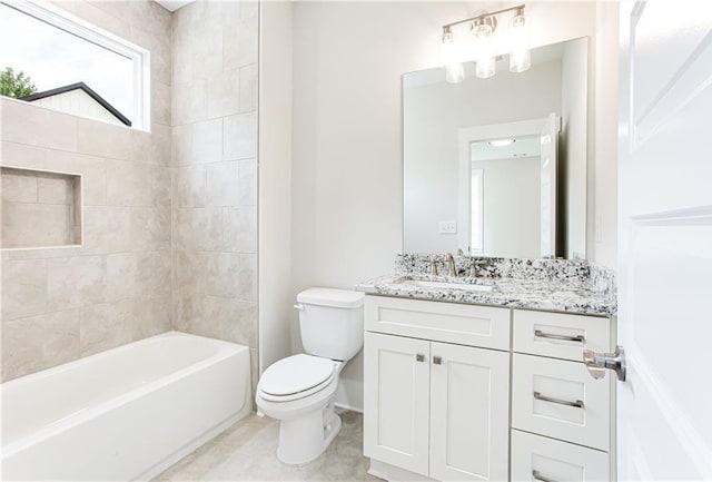 bathroom featuring vanity, toilet, tub / shower combination, and tile patterned flooring