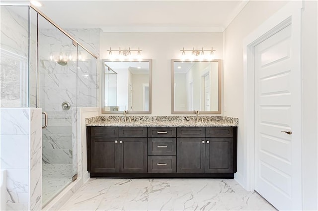 bathroom with double vanity, a marble finish shower, marble finish floor, and ornamental molding