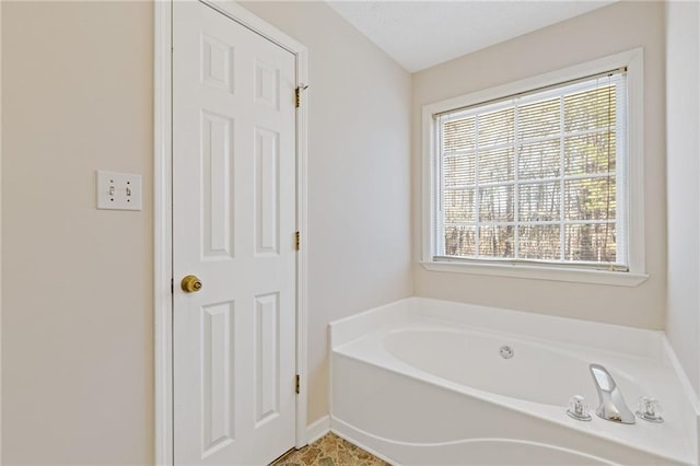 bathroom featuring a bathing tub