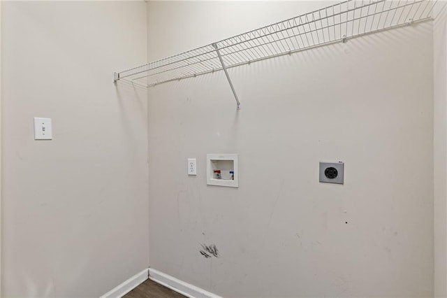 clothes washing area with washer hookup and hookup for an electric dryer