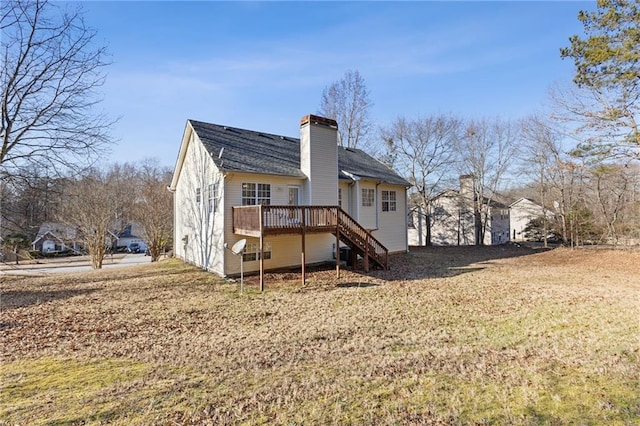 back of house featuring cooling unit, a lawn, and a deck