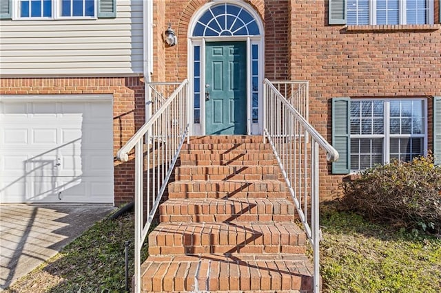 property entrance with a garage