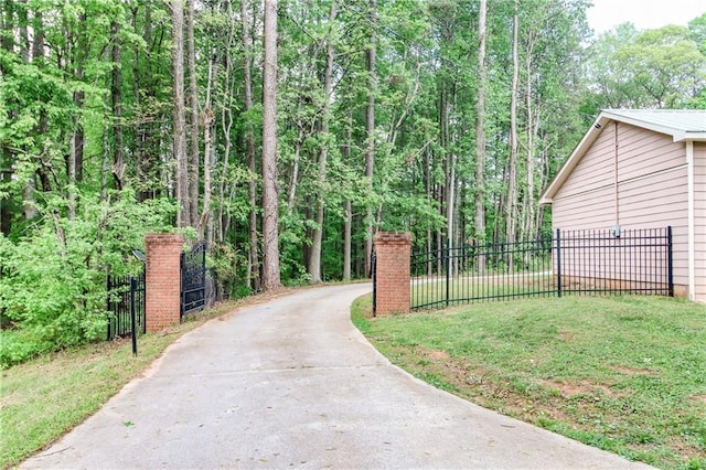 349 Harris Loop, Dallas, GA 30157 - gate featuring a view of trees