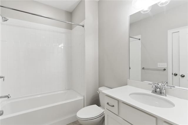 full bathroom featuring vanity, shower / washtub combination, and toilet