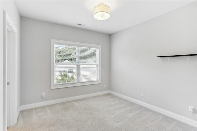 view of carpeted spare room