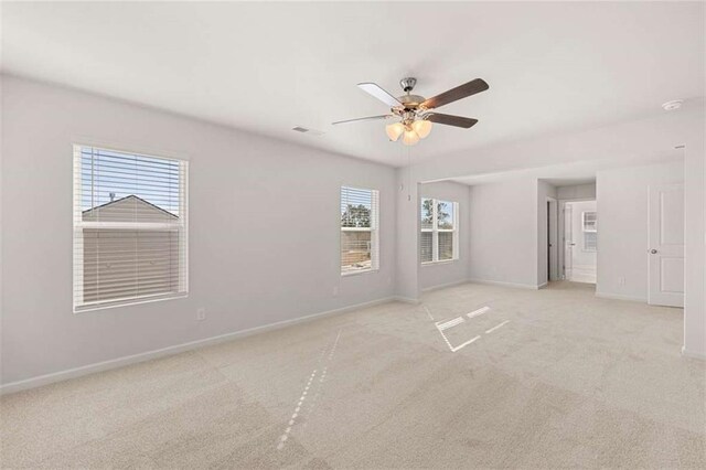 5430 Flat Rock Pt, Stonecrest, GA 30038 - unfurnished bedroom with light colored carpet, baseboards, and a ceiling fan