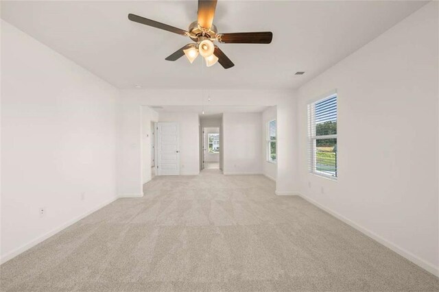 5430 Flat Rock Pt, Stonecrest, GA 30038 - unfurnished room with light carpet, baseboards, and ceiling fan