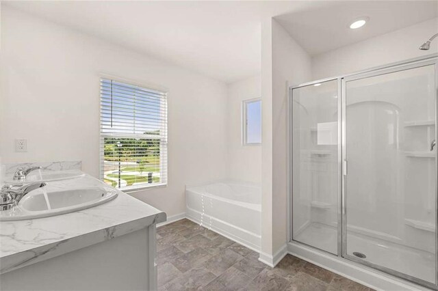 5430 Flat Rock Pt, Stonecrest, GA 30038 - full bath with baseboards, a stall shower, a garden tub, and double vanity