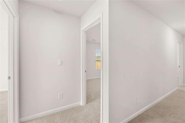 5430 Flat Rock Pt, Stonecrest, GA 30038 - hallway with carpet flooring and baseboards
