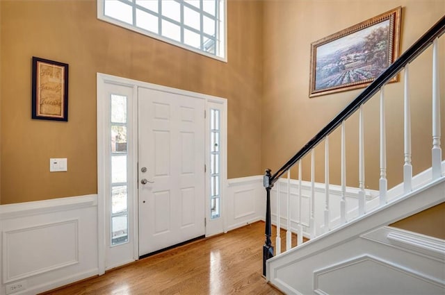 foyer with light hardwood / wood-style flooring