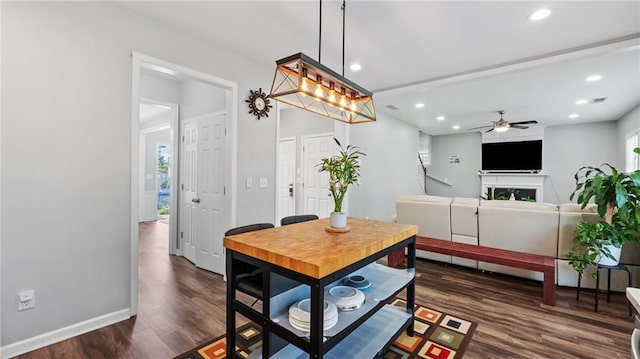 3525 Elder Field Ln, Cumming, GA 30040 - dining area featuring dark wood finished floors, a ceiling fan, recessed lighting, and baseboards