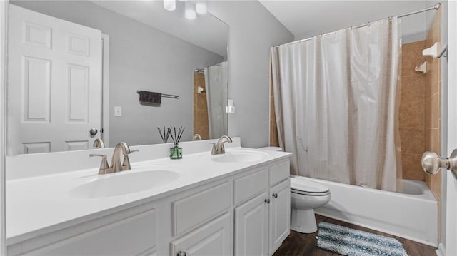 3525 Elder Field Ln, Cumming, GA 30040 - bathroom featuring wood finished floors, shower / bath combination with curtain, toilet, and double vanity