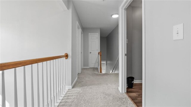 3525 Elder Field Ln, Cumming, GA 30040 - corridor featuring an upstairs landing, baseboards, and carpet floors