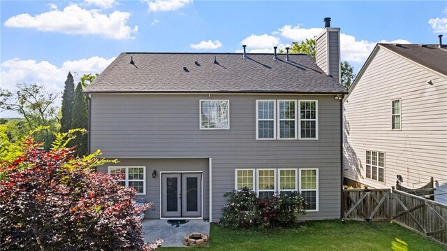 3525 Elder Field Ln, Cumming, GA 30040 - rear view of property with a gate, a chimney, and a shingled roof