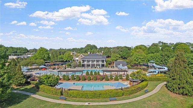 3525 Elder Field Ln, Cumming, GA 30040 - community pool featuring a water slide and a lawn