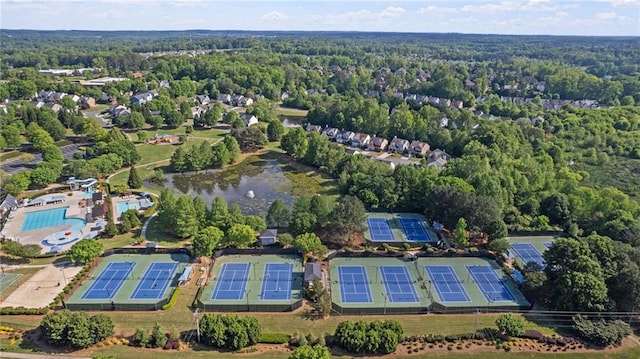 3525 Elder Field Ln, Cumming, GA 30040 - bird's eye view of a forest, a pool area, and a large body of water