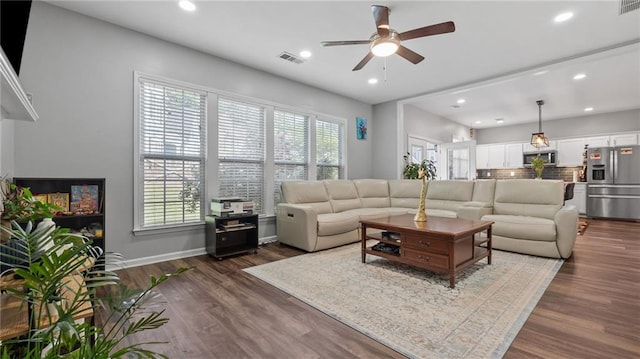 3525 Elder Field Ln, Cumming, GA 30040 - living area featuring plenty of natural light, ceiling fan, dark wood-type flooring, and recessed lighting