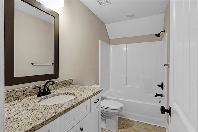 full bathroom featuring toilet, vanity, and bathing tub / shower combination