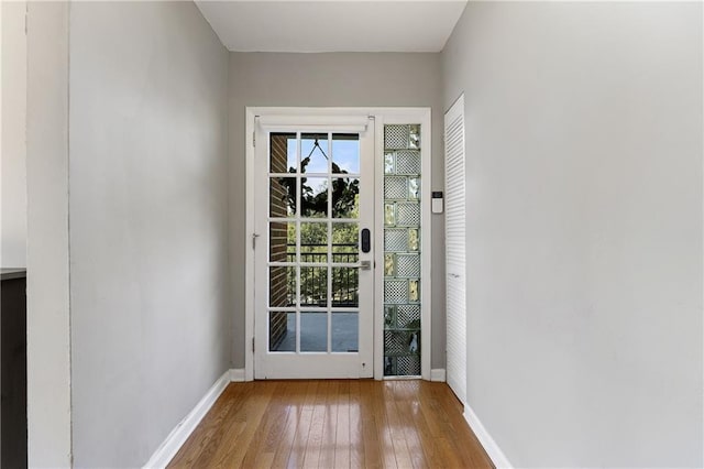 doorway to outside featuring hardwood / wood-style floors