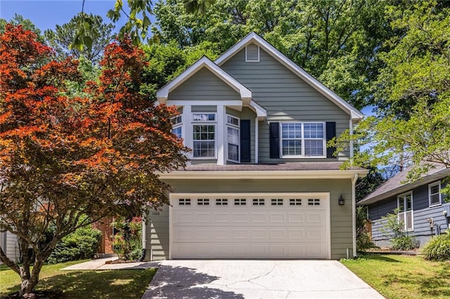 1100 Ashbury Dr, Decatur, GA 30030 - traditional-style home featuring an attached garage and concrete driveway