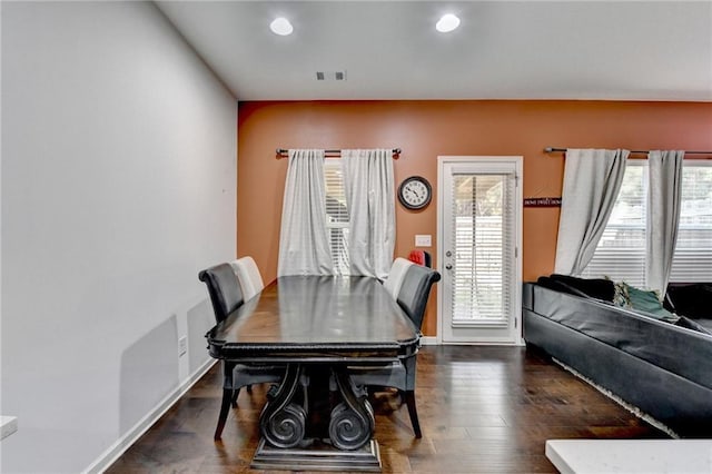 dining area featuring visible vents, baseboards, dark wood finished floors, and recessed lighting