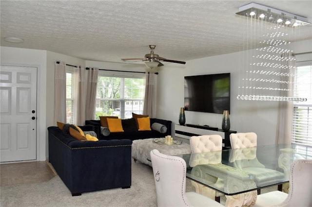 1218 Matt Moore Ct, Lithia Springs, GA 30122 - living area featuring a ceiling fan and a textured ceiling