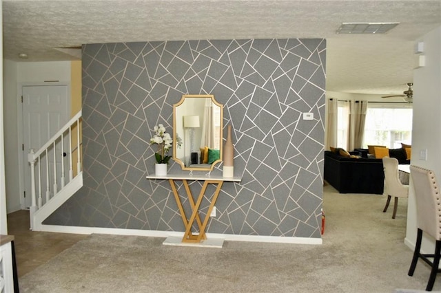 1218 Matt Moore Ct, Lithia Springs, GA 30122 - room details with carpet flooring, a ceiling fan, a textured ceiling, and visible vents