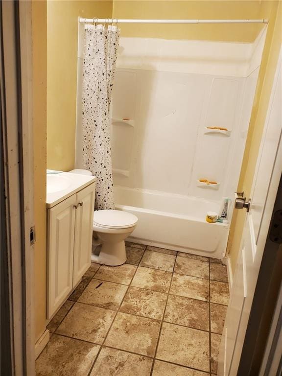 867 Commodore Dr NW, Atlanta, GA 30318 - full bathroom with shower / bath combo with shower curtain, toilet, and vanity