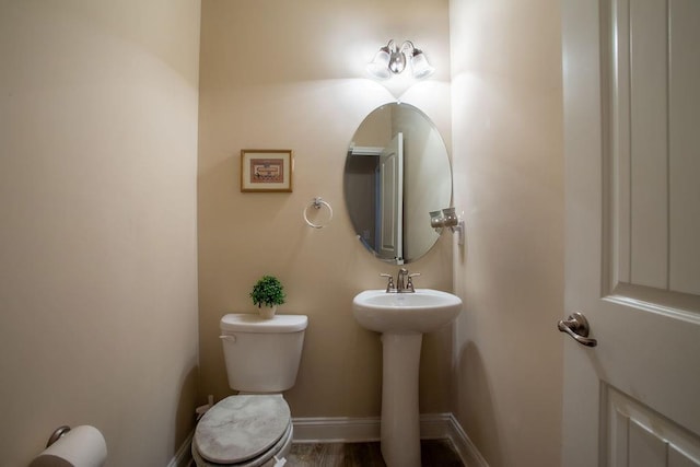 bathroom featuring toilet