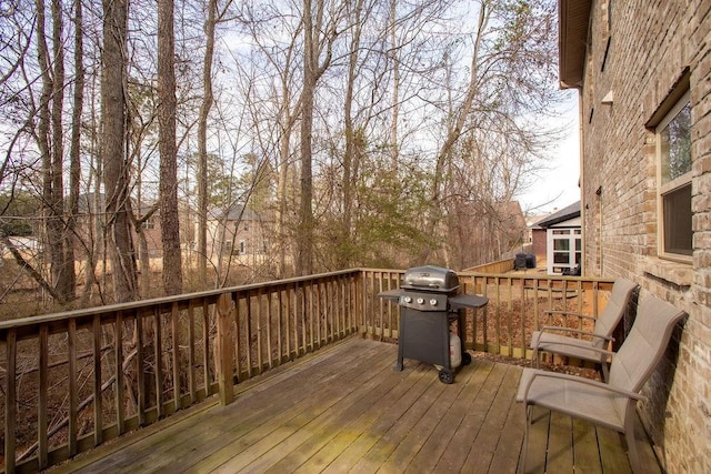 wooden terrace with grilling area