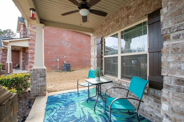 view of patio / terrace featuring ceiling fan, a porch, and central AC unit