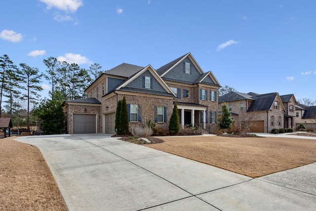 view of front of home featuring a garage, brick siding, and concrete driveway