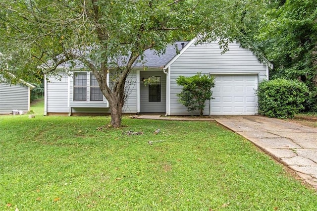 5426 Martins Crossing Rd, Stone Mountain, GA 30088 - view of front of house with concrete driveway, a front lawn, and an attached garage