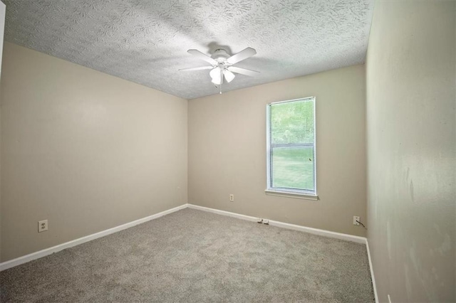 5426 Martins Crossing Rd, Stone Mountain, GA 30088 - carpeted empty room featuring a ceiling fan and a textured ceiling