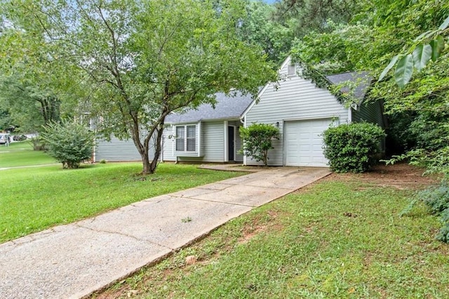 5426 Martins Crossing Rd, Stone Mountain, GA 30088 - view of front facade featuring a garage, concrete driveway, a front lawn, and roof with shingles