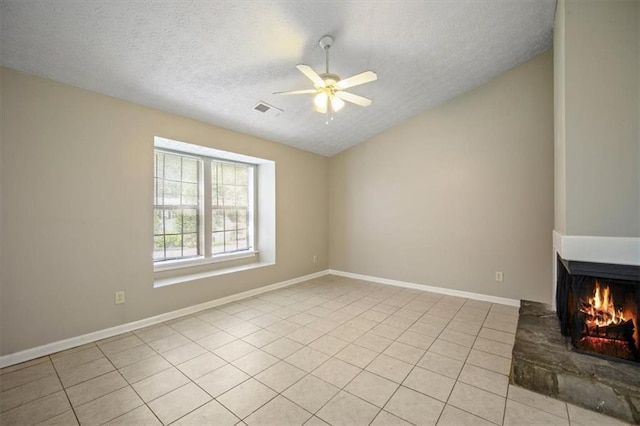 5426 Martins Crossing Rd, Stone Mountain, GA 30088 - unfurnished living room featuring vaulted ceiling, a textured ceiling, ceiling fan, light tile patterned floors, and a multi sided fireplace