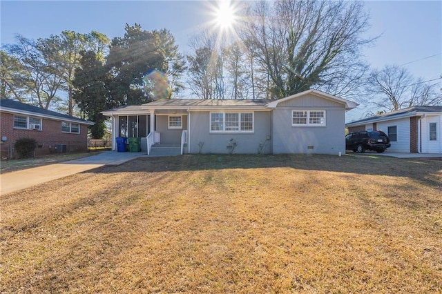 ranch-style home with a front yard