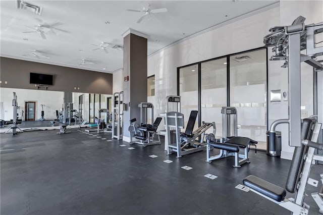 exercise room featuring ceiling fan and visible vents