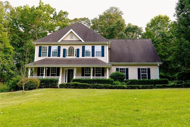 8601 Flint Hill Rd, Douglasville, GA 30135 - colonial house with a front yard and a porch