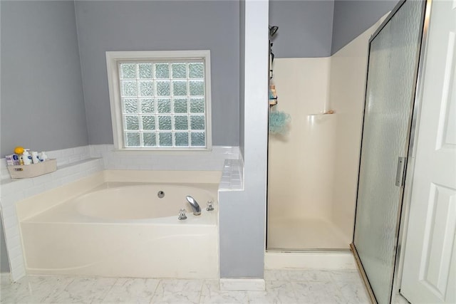 8601 Flint Hill Rd, Douglasville, GA 30135 - full bathroom featuring a bath, a shower stall, and marble look tiles