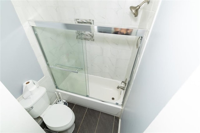 8601 Flint Hill Rd, Douglasville, GA 30135 - bathroom with shower / bath combination with glass door and toilet
