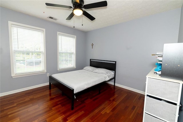 8601 Flint Hill Rd, Douglasville, GA 30135 - bedroom with wood finished floors, baseboards, and ceiling fan