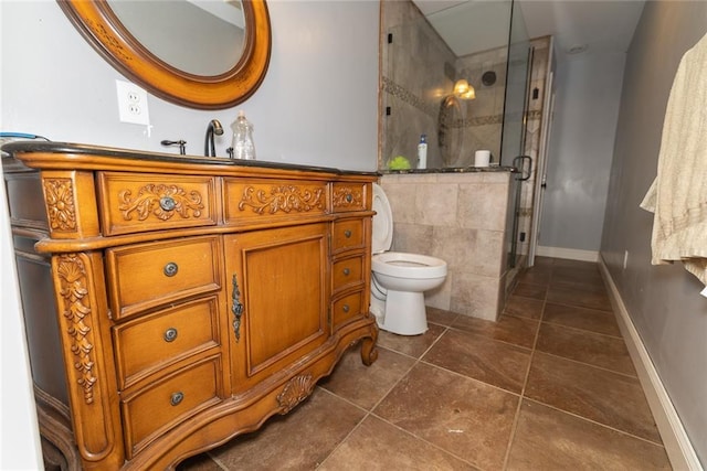 8601 Flint Hill Rd, Douglasville, GA 30135 - full bathroom featuring toilet, vanity, a shower stall, tile patterned flooring, and baseboards