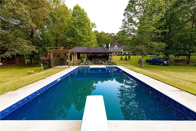 8601 Flint Hill Rd, Douglasville, GA 30135 - swimming pool with a gazebo, a diving board, a yard, and view of scattered trees