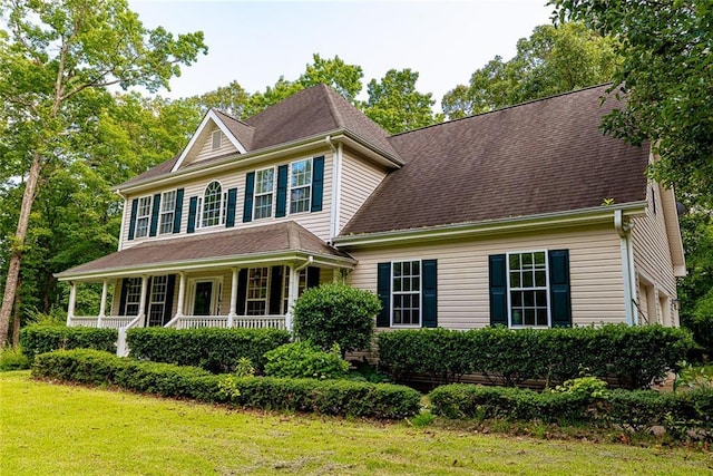 8601 Flint Hill Rd, Douglasville, GA 30135 - colonial inspired home featuring covered porch and a front lawn