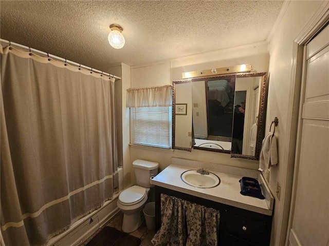 bathroom with a shower with curtain, a textured ceiling, vanity, and toilet